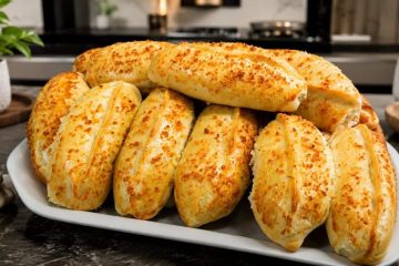 Delicioso pãozinho recheado de queijo e linguiça: a receita irresistível para encantar sua família ou impulsionar suas vendas!