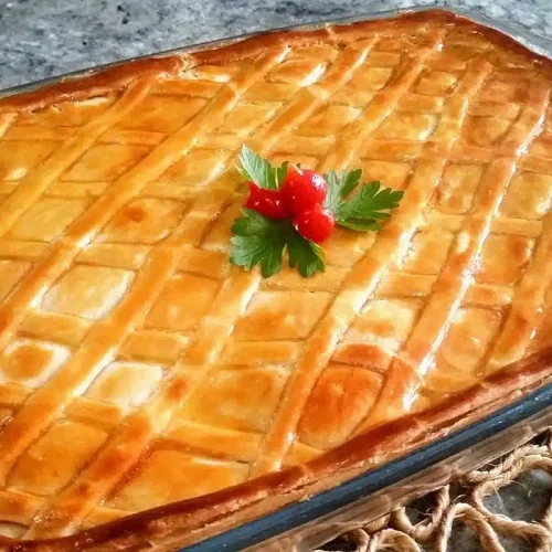 Empadão de frango e palmito: massa irresistível e recheio aveludado que derrete na boca